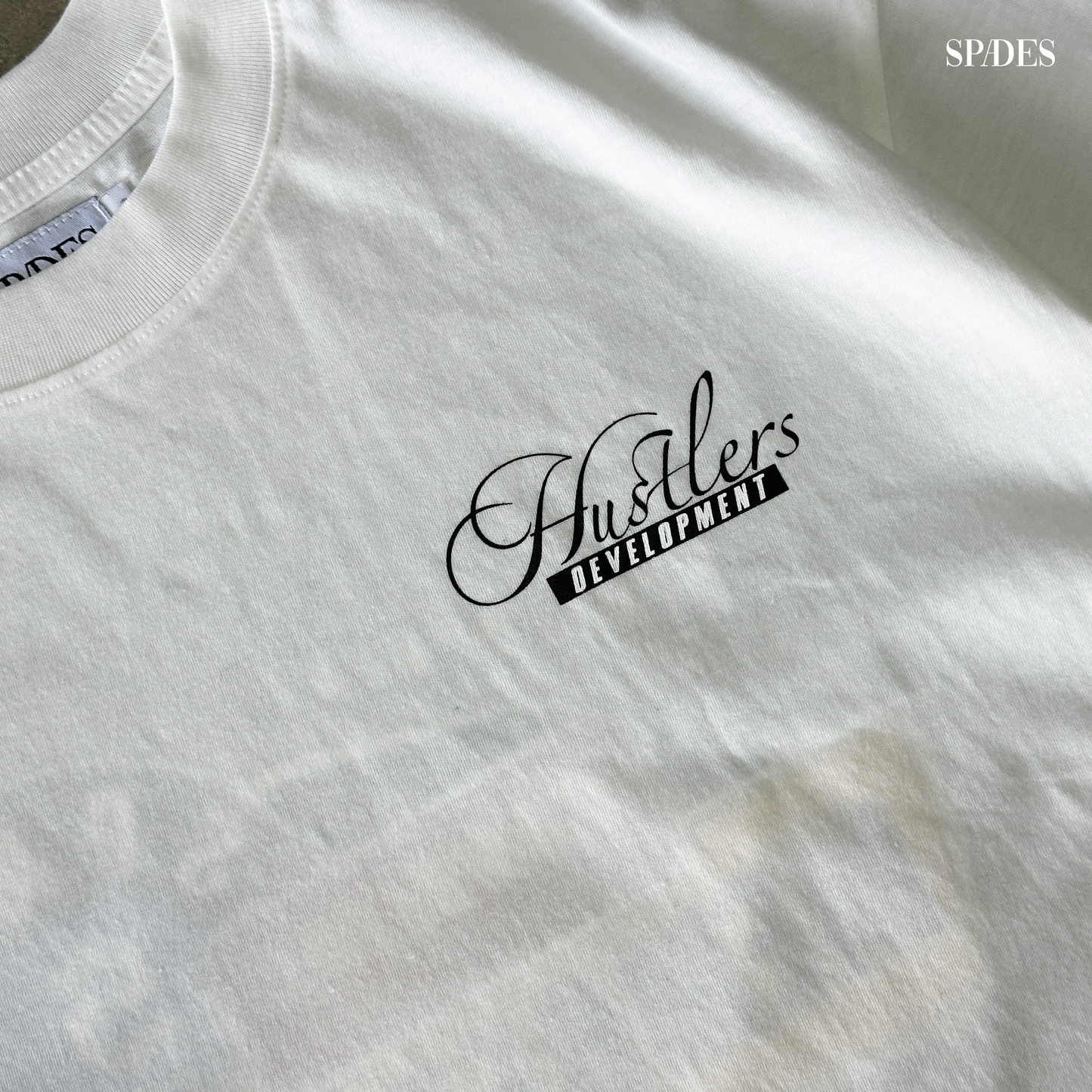 Hustler Development Club Box Tee Off white
