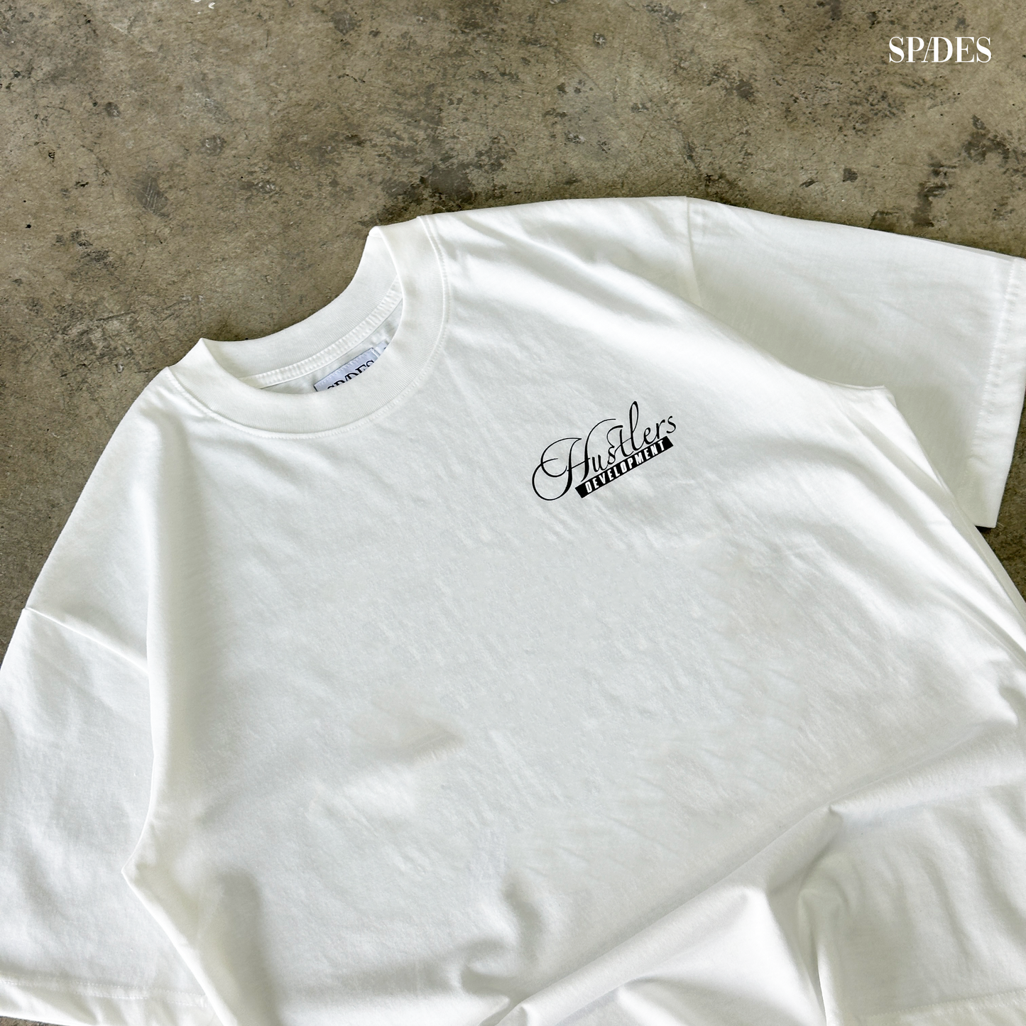 Hustler Development Club Box Tee Off white